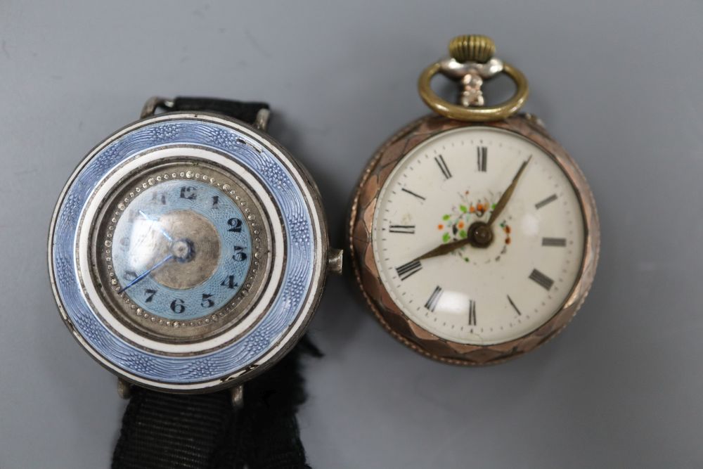 A silver and enamel wrist watch, a silver napkin ring, silver pill box and five assorted worn coins.